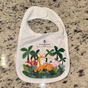 Four Seasons White Baby Bib with Jungle Animal Design